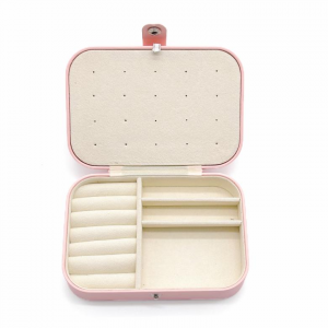 Featuring padded roll slots and a padded panel, this streamlined leather jewelry box is perfect for storing rings and earrings, perfect for display or gifting